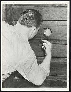 This May Remind Someone of Prohibition. May 20 But really it bears no relation to a "speak" where only the well-known could enter. At the peephole is the doorkeeper who is admitting only those he recognizes as members of the Riverside, Atlanta, local of the old United Textile Workers. They were meeting to consider CIO membership at the request of A. Steve Nance, southern director of the Textile Workers Organization Committee of CIO. The man seeking entrance also seems to be giving some sort of signal.
