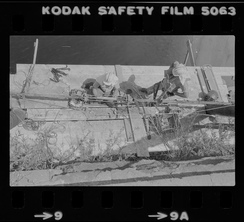 Telephone company underwater cable repair at Deer Island