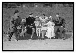 Boston Park Department Commissioner William Long on left sitting with a group of people, Boston Common