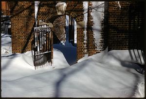 Open gate in snow drift