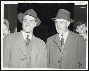 And the Difference is 19- The alert photographer greeting the Boston Bees at their homecoming last night found Sebi Sisti (left) the 20-year-old Bees third baseman, and the located Johnny Cooney (right), the 39-year-old outfielder-coach, giving you the youngest and oldest.