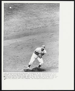 Minneapolis - St. Paul – Opening Up The Gates – Dodgers third baseman Jim Gilliam boots ball hit by Twins Zoilo Versalles in sixth inning of second World Series game today. Gilliam was charged with two-base error and the boot paved the way for the Twins first two runs in their 5-1 victory over the Dodgers.