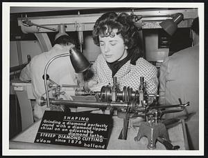 Woman using diamond-cutting machine