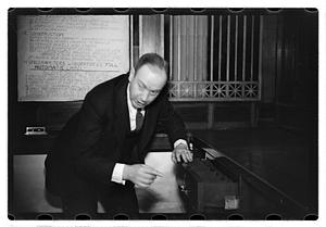 A man demonstrating how to break into a safe