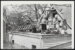 It'll Give me Time to Catch up on my Embroidery -- That's the answer Mrs. Colin Campbell of Fargo, N.D., gave a flood rescue crew when she turned down a ride to shore. Mrs. Campbell, whose home is along the bank of the rampaging Red river, said she was comfortable and didn't intend to move. The Red hit 34.37 feet yesterday, more than 17 feet over flood stage.