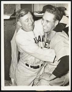 When a Feller Gets a Friend So delighted was Manager Oscar Vitt (left) of the Cleveland Indians with Bob Feller's no-hit pitching performance in the April 16 opener in Chicago, that he hugged the young Iowan, as shown, above. The no-hitter defeated the White Sox, 1-0, before 14,000 roaring fans. Feller is from Van Meter, Ia.