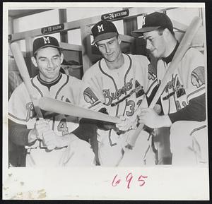 Tribal Tomahawks that helped to scalp the Giants yesterday are checked by their owners. Sid Gordon (left) got a homer and a triple, Pitcher Lou Burdette collected two for three, and Eddie Mathews (right) banged out a homer and a double in the Braves, 11-1, victory.