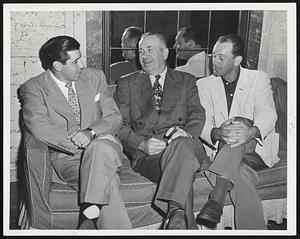 Former Boston Players now with Washington Senators listen to a yarn spun by Senators’ coach Joe Fitzgerald (center) in Kenmore lobby. Left is Sam Dente ex-Red Sox shortstop. Right is Mike McCormick, one-time Braves’ chattel. Senators were playing Red Sox today.