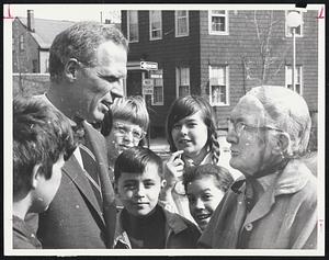 Street Corner Chat in Charlestown. Mayor White, during four-hour walking tour in perfect Spring weather – and followed everywhere by youngsters – stopped to talk with Mrs. Mary Rothwell of Monument street.