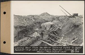 Contract No. 80, High Level Distribution Reservoir, Weston, looking west from Sta. 889+10+/-, showing invert to upper aqueduct, high level distribution reservoir, Weston, Mass., Mar. 20, 1940