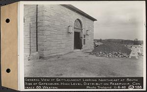 Contract No. 80, High Level Distribution Reservoir, Weston, general view of settlement looking northeast at south side of gatehouse, high level distribution reservoir, Weston, Mass., Nov. 6, 1940