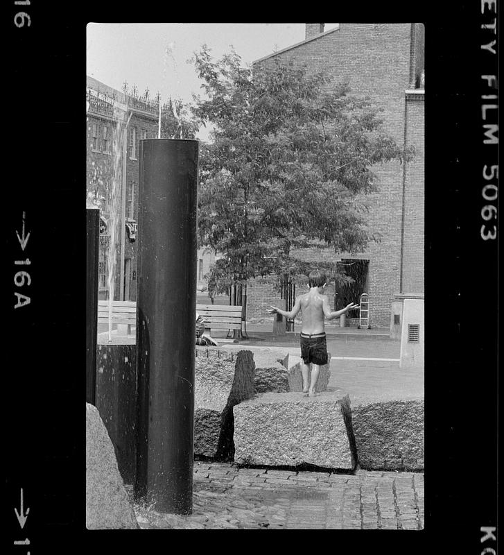 Boy and fountain Inn Street