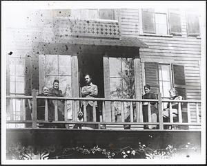 Cutter Retreat- Group of people on balcony