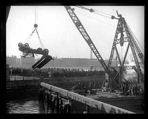 Pulling out the death truck that killed two men as it plunged into the Mystic River at Chelsea Bridge