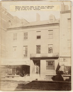 Wendell Philips' home, on the site of Harrison Avenue at the corner of Essex Street. The man in the doorway is Mr. Phillips