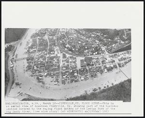 Pikeville, Ky. Flood Scene--This is an aerial view of downtown Pikeville, Ky. showing part of the business section covered by the raging flood waters of the Levisa Fork of the Big Sandy River.