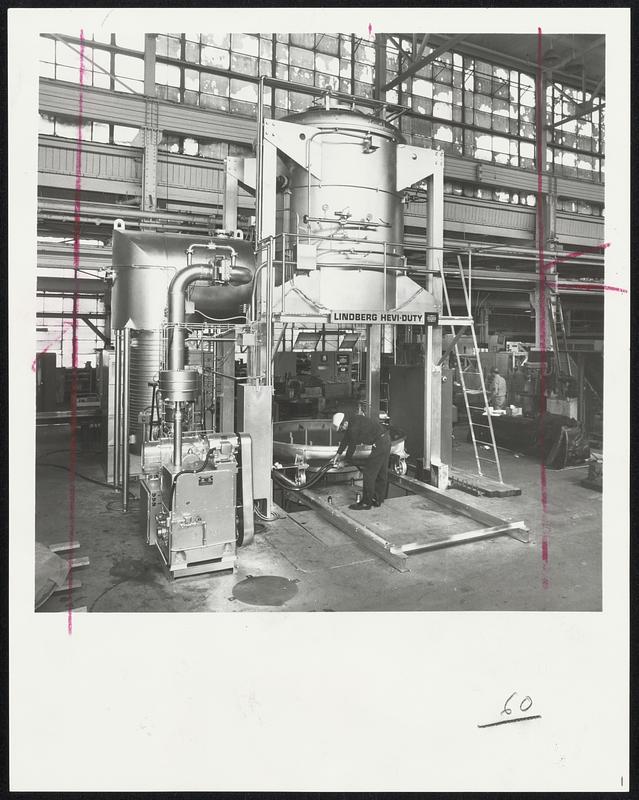 Automated Furnace -- This large 60-inch-diameter vacuum furnace at the Lindberg Hevi-Duty Chicago manufacturing facility, will be installed at United Air Lines' san Francisco maintenance base. The unit uses combinations of vacuum and partial pressure to achieve a wide range of heat treatment capability.