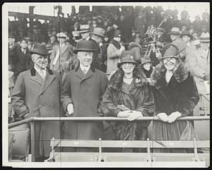 Washington April (AAP) Cabinet Members Drop Cares of State for Game. Members of President Hoover's cabinet accepted their chief's invitation to see the opening baseball game of the season. Left to right; Secretary Davis of Labor, Secretary Adams of the Navy, Mrs Adams and Mrs. Robert P. Lamont, wife of the Secretary of Commerce.