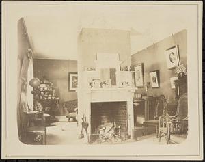 Room with fireplace, mantle, and antiques