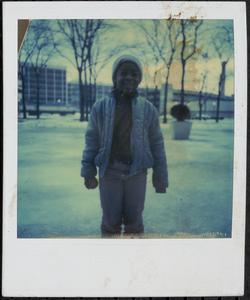 Child outside in winter outfit