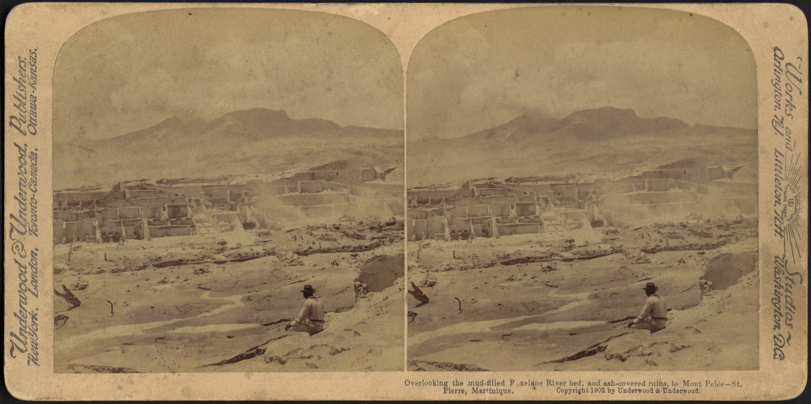 Overlooking the mud-filled Roxelane River bed, and ash-covered ruins, to Mont Pelée, St. Pierre, Martinique