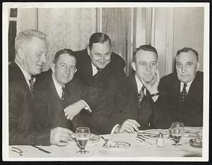 Honor Former American League Umpire Leading figures in baseball world met in Syracuse, N.Y., April 20, to honor "Big Bill" Dineen, former American League umpire and pitcher for Boston Red Sox in world series of 1903. Left to right: Frank J. Shaughnessy, president of the International League; Eddie Collins, General Manager of the Boston Red Sox; Jack Corbett, president of the Syracuse Chiefs; Jim Bottomley, manager of the Syracuse Chiefs and Edward Schoeneck of Syracuse, former Lieutenant Governor of New York state.