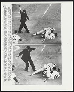 A Change of Viewpoint -- Umpire Ed Sudol Signals that Deron Johnson of the Cincinnati Reds is out at home as he tumbles with New York Mets catcher Johnny Stephenson (18), but changes his call to safe, bottom, when he sees that the ball had been knocked out of Stephenson's glove and is under him, arrows. Johnson scored the first run for the Reds on play in second inning of last night's game in New York when Leo Cardenas singled to left. Stephenson was charged with an error on the play. Reds won the game, 2-1, to move into second place in the National League.