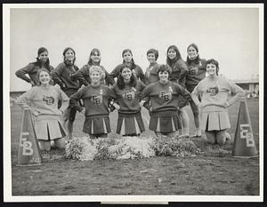 East Boston. Arms Linked give these happy East Boston High School cheerleaders the pep they show on the field. Front, from left, Lynda Lepone, Donna Scaramella, Diane Ruggirio, Jo Manredonia and Doreen Foti. Rear, Gladys Kitchell, Karen Asci, Kathy Murrison, Linda Garufo, Linda Grifone, Linda Zeuli and Allyn Christopher.