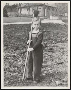 Maurice J John Jr. going out to clean plot for Victory Garden