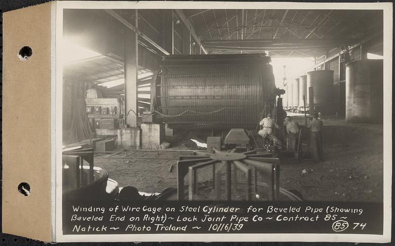 Contract No. 85, Manufacture and Delivery of Precast Concrete Steel Cylinder Pipe, Southborough, Framingham, Wayland, Natick, Weston, winding of wire cage on steel cylinder for beveled pipe (showing beveled end on right), Natick, Mass., Oct. 16, 1939