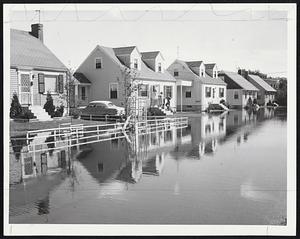 Little Dutch Mill-That's all that's needed to complete this old Holland scene which happens to be Bare Hill Road in Framingham after the Sudbury river came in.