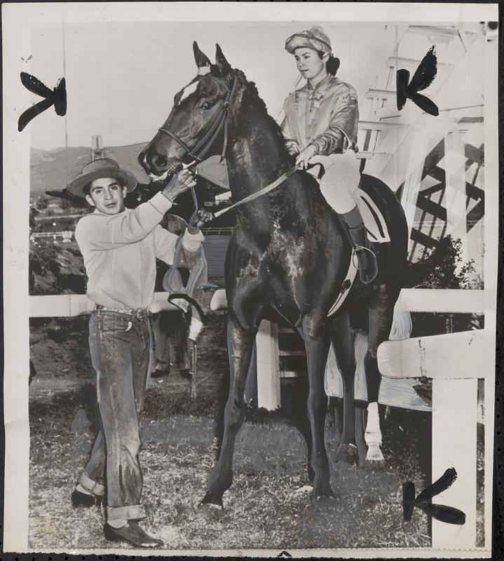 Defeats jockey Longden