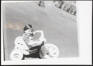 Young child on a tricycle