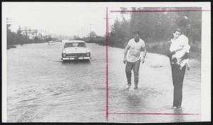 Rescued From Hurricane Flood -- Mrs. J. C. Snider weeps as she clutches her baby after she and her husband reached high ground after their car drowned out and was swept away by flood waters after Hurricane Ione hit New Bern, N. C., yesterday. Snider's foot was believed broken.