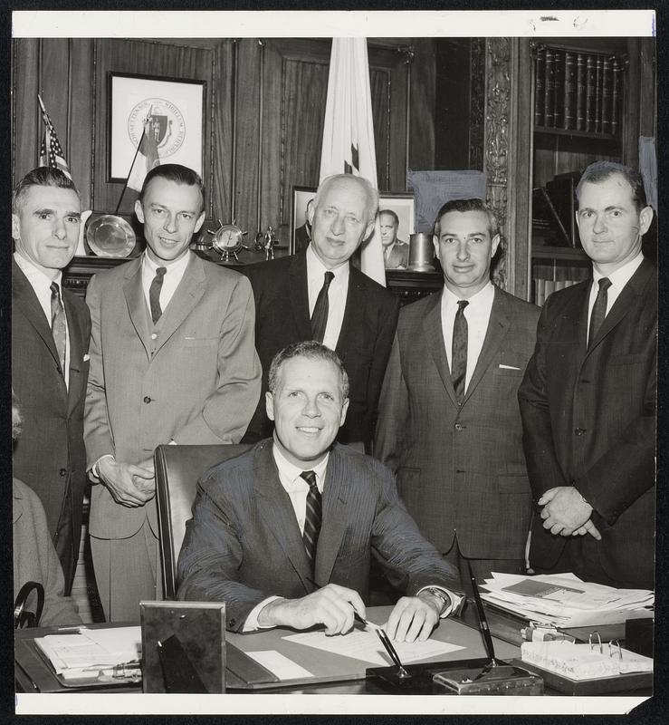 CPA Officials look on as Secretary of State Kevin White signs charter ...