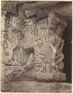 On the north side of the entrance to Kailasa Court, Siva with Brahma as charioteer