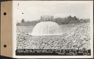 Contract No. 112, Spillway at Shaft 2 of Quabbin Aqueduct, Holden, water being discharged at Shaft 2 at 11:10 am, looking upstream from bed of channel, Holden, Mass., May 14, 1943