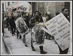 Black Panthers picket in front of the Federal Building in Post Office Square as part of nationwide demand for release from jail of militant leaders