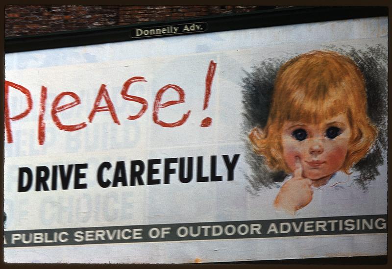 Billboard reading "Please! Drive Carefully," Boston