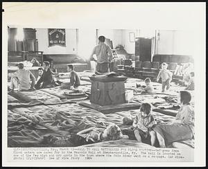 Wall to Wall Mattresses for Flood Victims--Refugees from flood waters are cared for in the Masonic Hall at Shepherdsville, Ky. The hall is located on one of the few high and dry spots in the town where the Ohio River went on a rampage.