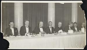 At South Boston Citizens' Dinner at Hotel Bradford. Head table at the South Boston Citizens' dinner last night at the Hotel Bradford. Left to right, Arthur J. O'Keefe, director of celebrations, Judge William J. Day of the South Boston court, Mayor Mansfield, Richard J. Dwyer, toastmaster, the Rev. Fr. James O'Rourke of the St. Peter and St. Paul Church, South Boston, Daniel Lyne, member of the crime commission, Councilman John E. Kerrigan and Representative Owen Gallagher.