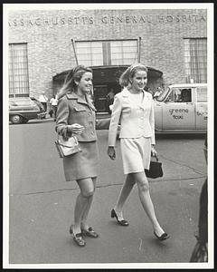 Mrs. Kevin White (R) + Sister Nancy Galvin leave MGH after visiting Mayor.