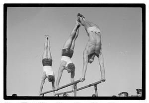 Gymnasts on parallel bars
