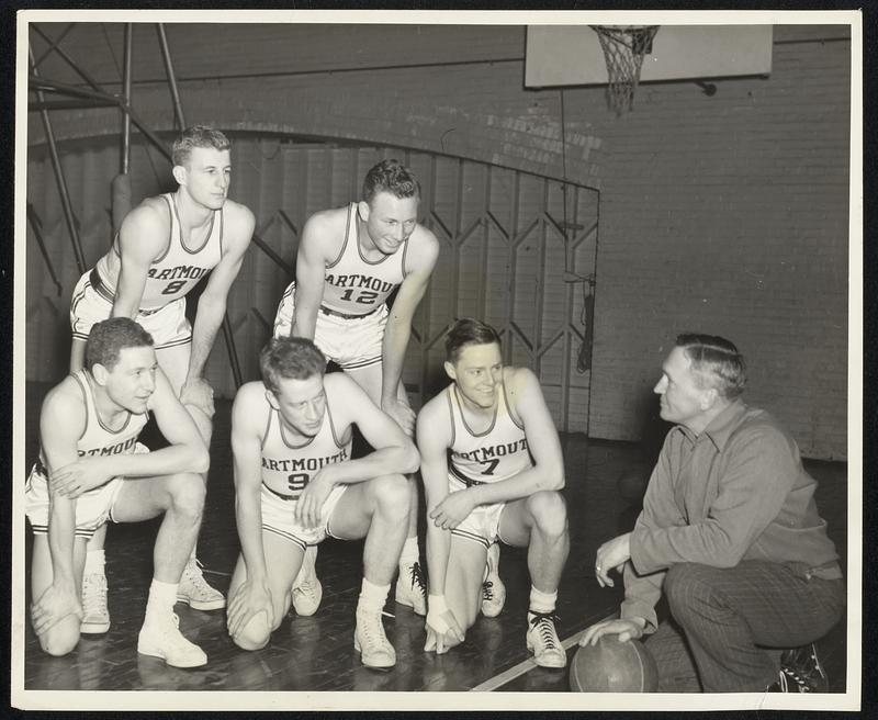 Out Where The West Begins -- Coach Ossie Cowles, who has directed Dartmouth basketball teams to five straight Eastern intercollegiate league titles, gives instructions to his latest charges before their western trip, Jan. 6-11. In back, left to right: Bob Myers and Jim Olsen. In front, Jim Briggs, Capt. Stan Skaug, George Munroe and Coach Cowles.