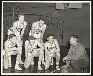 Out Where The West Begins -- Coach Ossie Cowles, who has directed Dartmouth basketball teams to five straight Eastern intercollegiate league titles, gives instructions to his latest charges before their western trip, Jan. 6-11. In back, left to right: Bob Myers and Jim Olsen. In front, Jim Briggs, Capt. Stan Skaug, George Munroe and Coach Cowles.