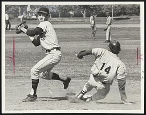 Dorchester High's John Collins whirls away from sliding Bill Clifford of Boston Tech in second inning of Boston City League playoff game. Collins made force-out and Dorchester beat Tech, 2-0, at Fens Stadium.