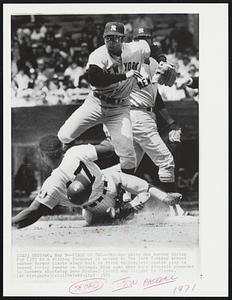 First of Two -- Chicago White Sox runner Carlos May (17) is a sliding forceout at second as New York Yankees second sacker Horace Clarke wings ball to first to complete double play in second inning Sunday in Chicago. Play came when Luis Alvarado grounded to Yankees shortstop Gene Michael (rear) who flipped to Clarke.