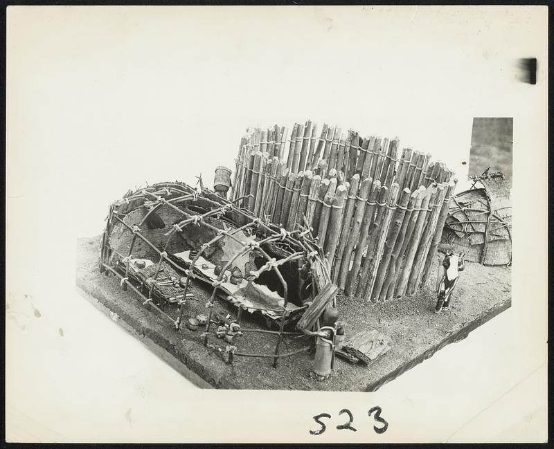 Reconstructed Model of Ancient Indian Community Built by James R. Miller. On Left is Workshop, Incenter the Stockade and a Typical Dwelling on Right.