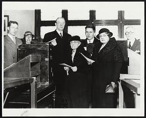 Frederick E Mansfield and his family voting at the old Swedish Church at Elm Hill Avenue at Warner Street, Roxbury.