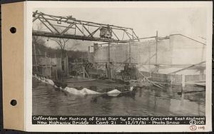 Contract No. 21, Portion of Ware-Belchertown Highway, Ware and Belchertown, cofferdam for footing of east pier and finished concrete east abutment, new highway bridge, Ware and Belchertown, Mass., Dec. 17, 1931